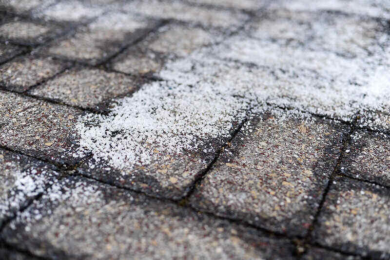 close-up of salt on a sidewalk to melt snow