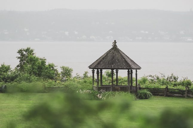 Backyard overlooking mountains and water with gazebo