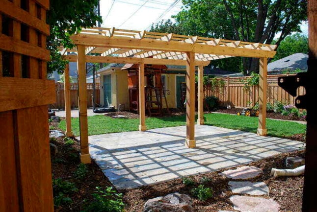 Bluestone patio with wooden pergola