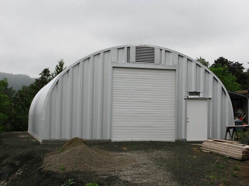 large curved roof storage shed