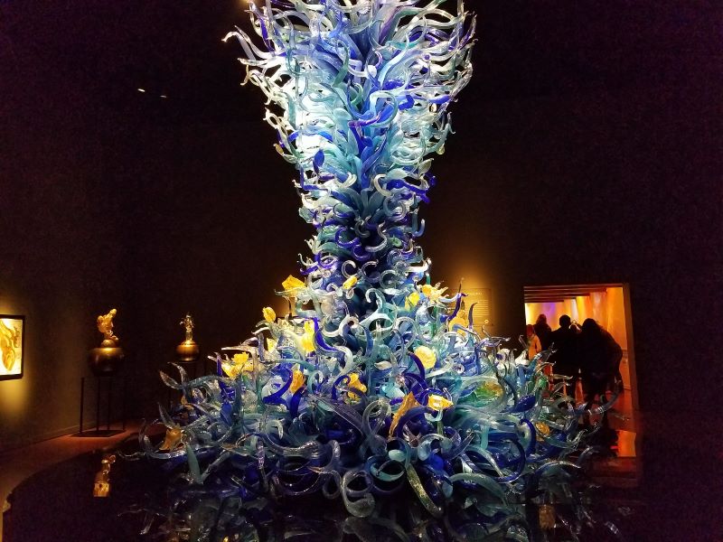 Dale Chihuly’s two-story “Sea Life” sculpture, made of thousands of blown-glass “tentacles,” sits inside the Chihuly Glass and Garden museum in Seattle.