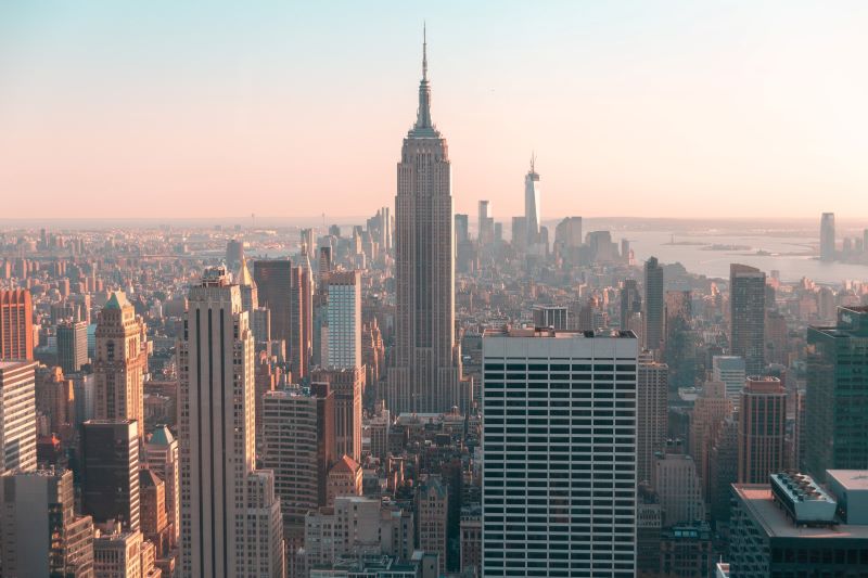 Morning light reflects across New York City’s skyline.