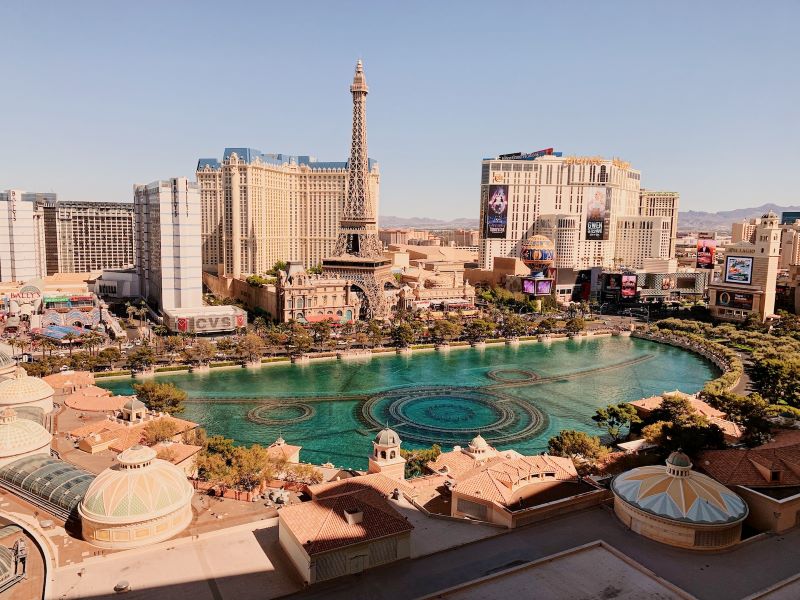 A shot of the Paris Las Vegas Hotel & Casino and the Planet Hollywood Las Vegas Resort & Casino, along with surrounding buildings in Las Vegas, Nevada