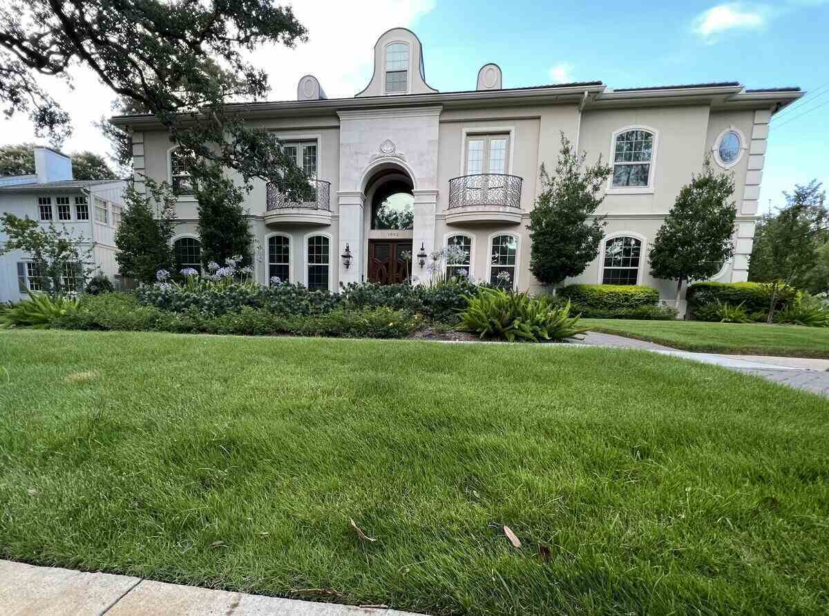 Lush lawn in front of a two-story home in Houston