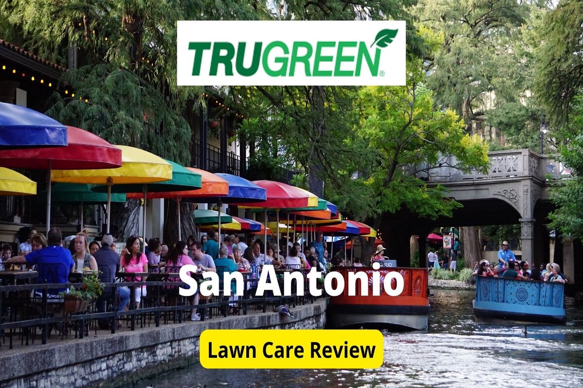 Text: Trugreen in San Antonio Review | Background image: People riding on red boat on river dusring day time
