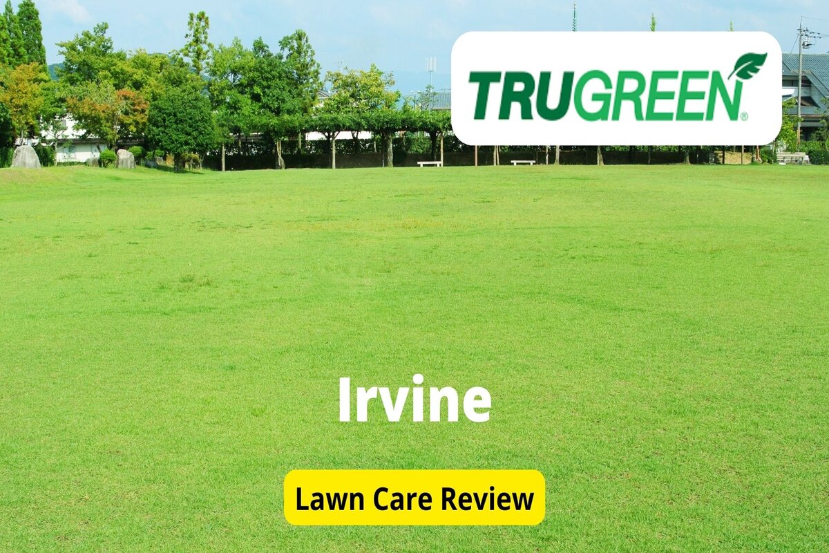 Text: Trugreen in Irvine | Background Image: Clear Grees Grass in front of some Huts