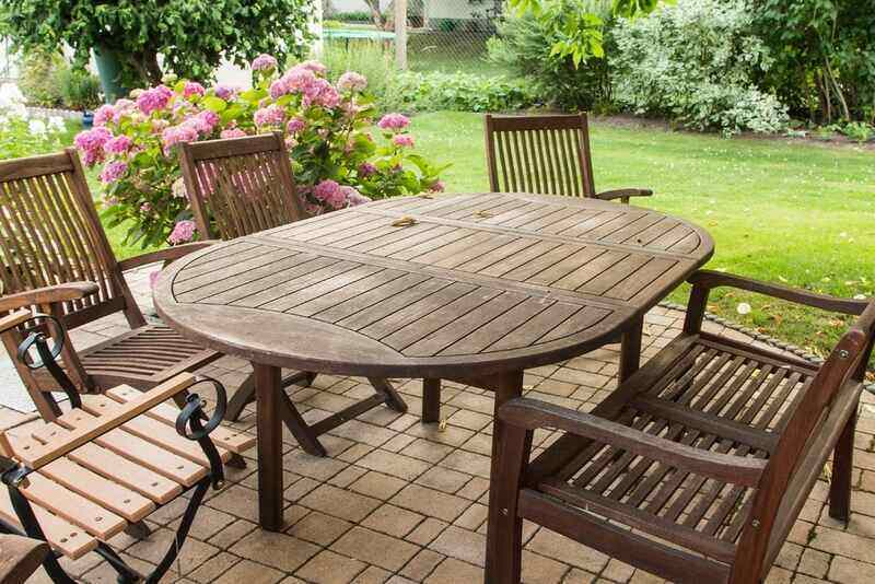 Wooden table chair in garden