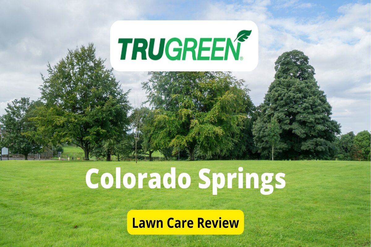 Text: Trugreen in Colorado Spring | Background Image: Green Fields with Tress