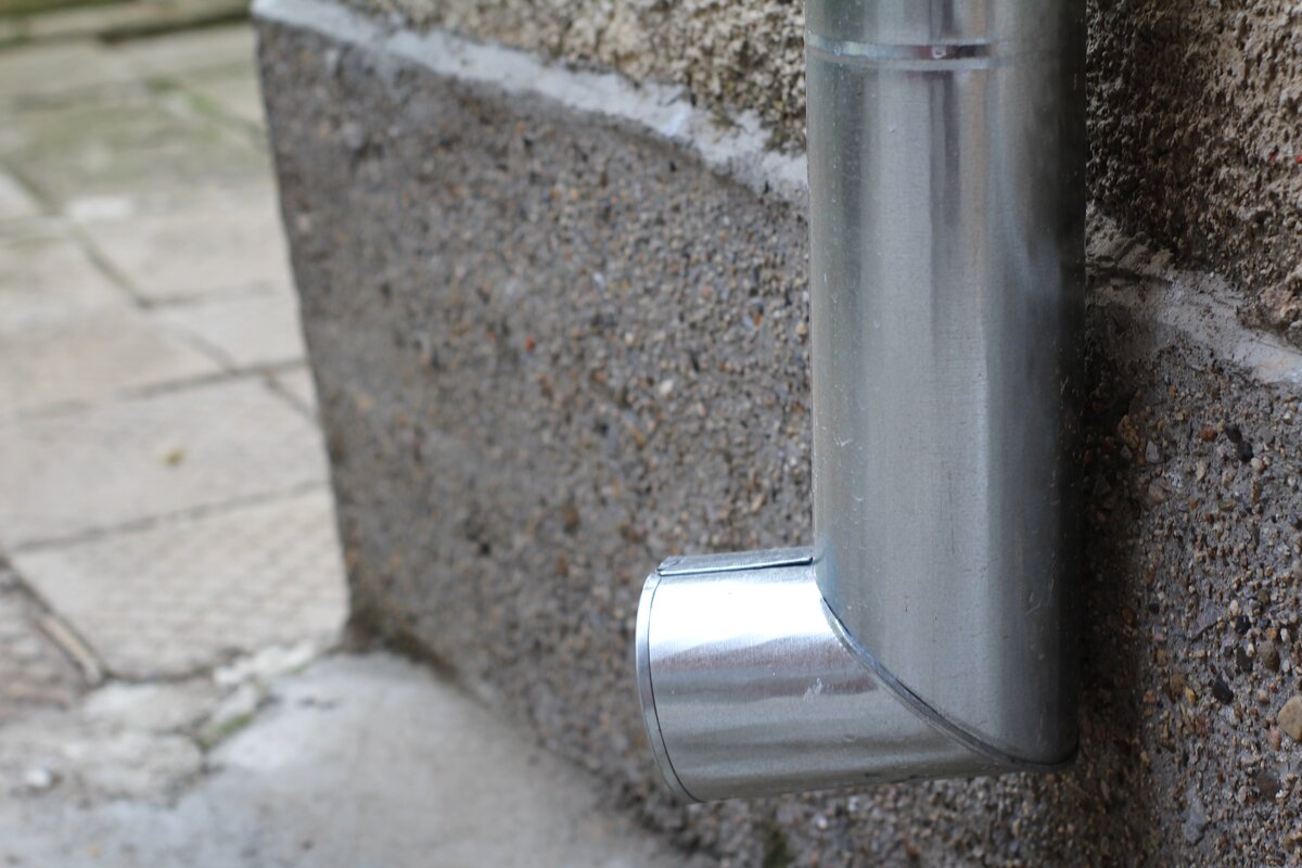 Text: Gutter DownSpout | Background Image: Gutter DownSpout