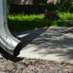 How to Install or Replace a Gutter Downspout