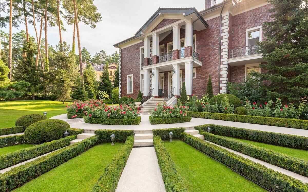 Build a living fence around your property with shrubs, trees, and plants that add privacy and beauty to your yard.