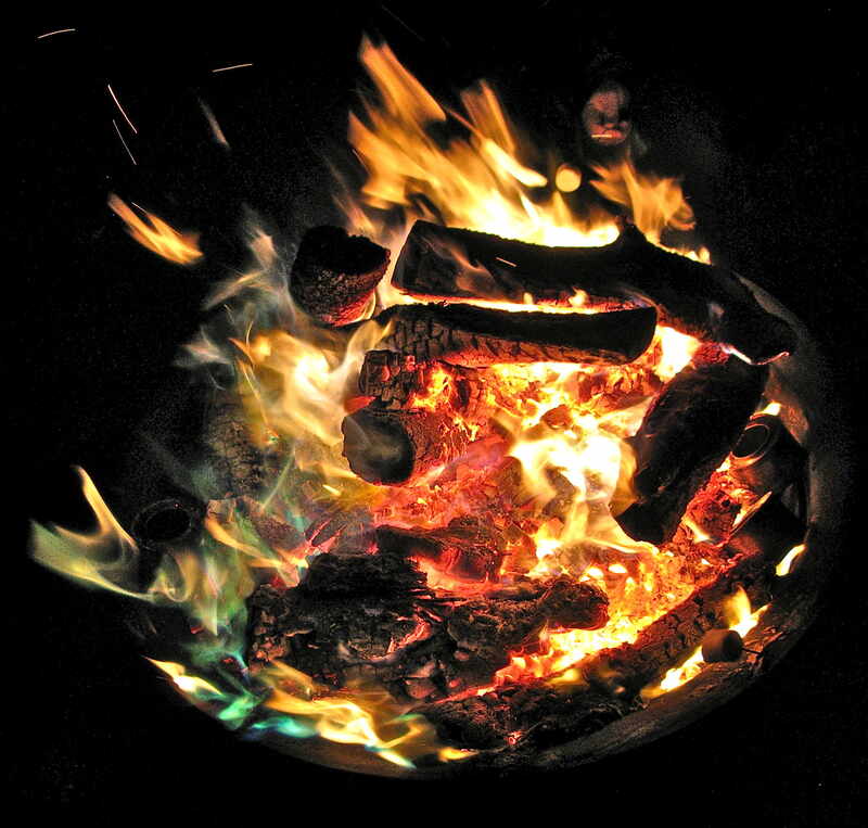 flames by metal fire pit