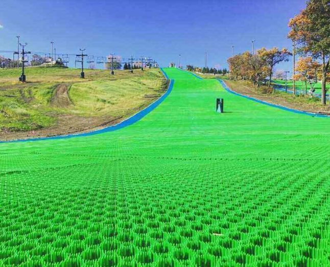 Grass ski slope at Buck Hill in Minnesota showing the Neveplast underneath