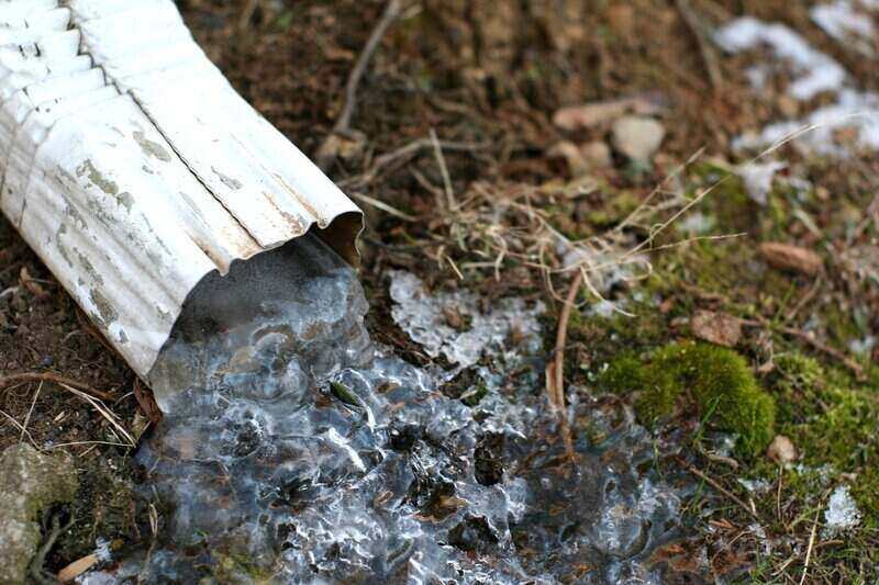 How to Keep Buried Gutter Downspouts from Freezing