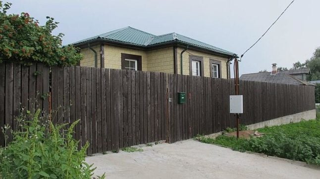 A composite fence of a lawn