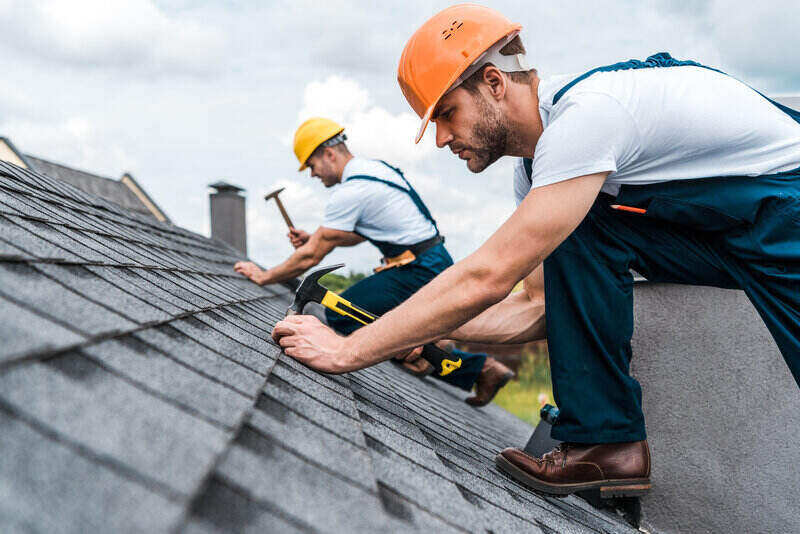 Workers working on Reroofing