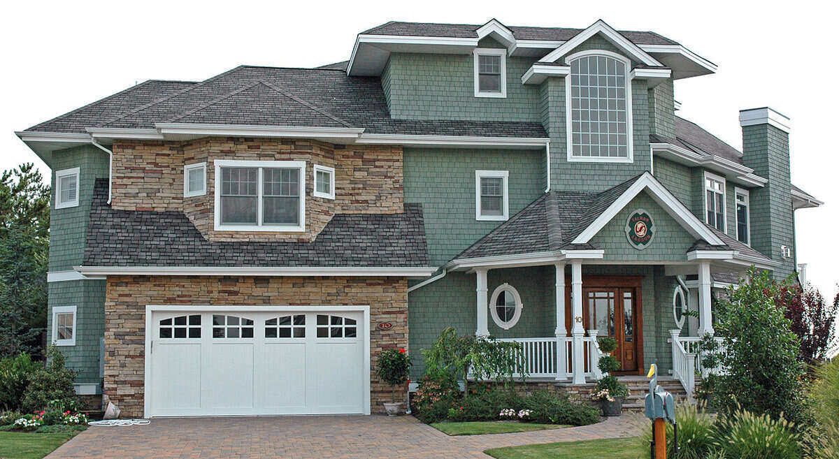 Multistory home with asphalt shingle roof in New Jersey