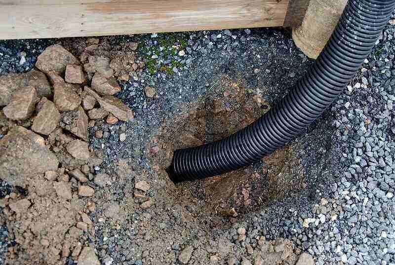 How to Keep Buried Gutter Downspouts from Freezing