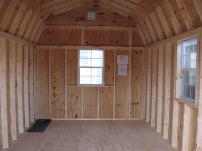 interior of a she shed installed in a backyard