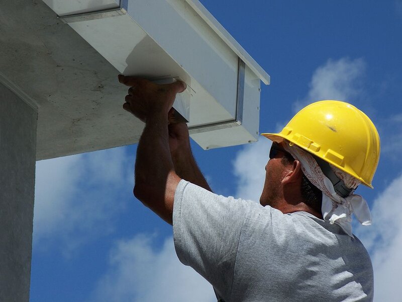 Man installing the Box Gutter