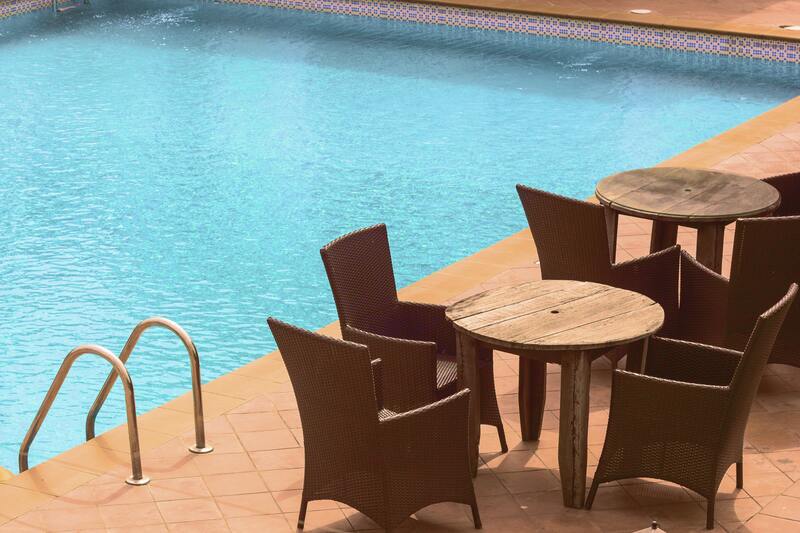 chairs around pool