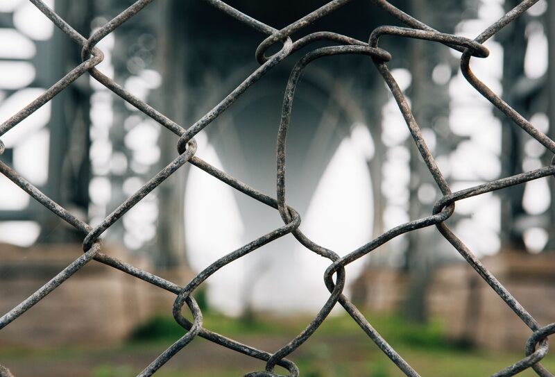 damaged chain link fence
