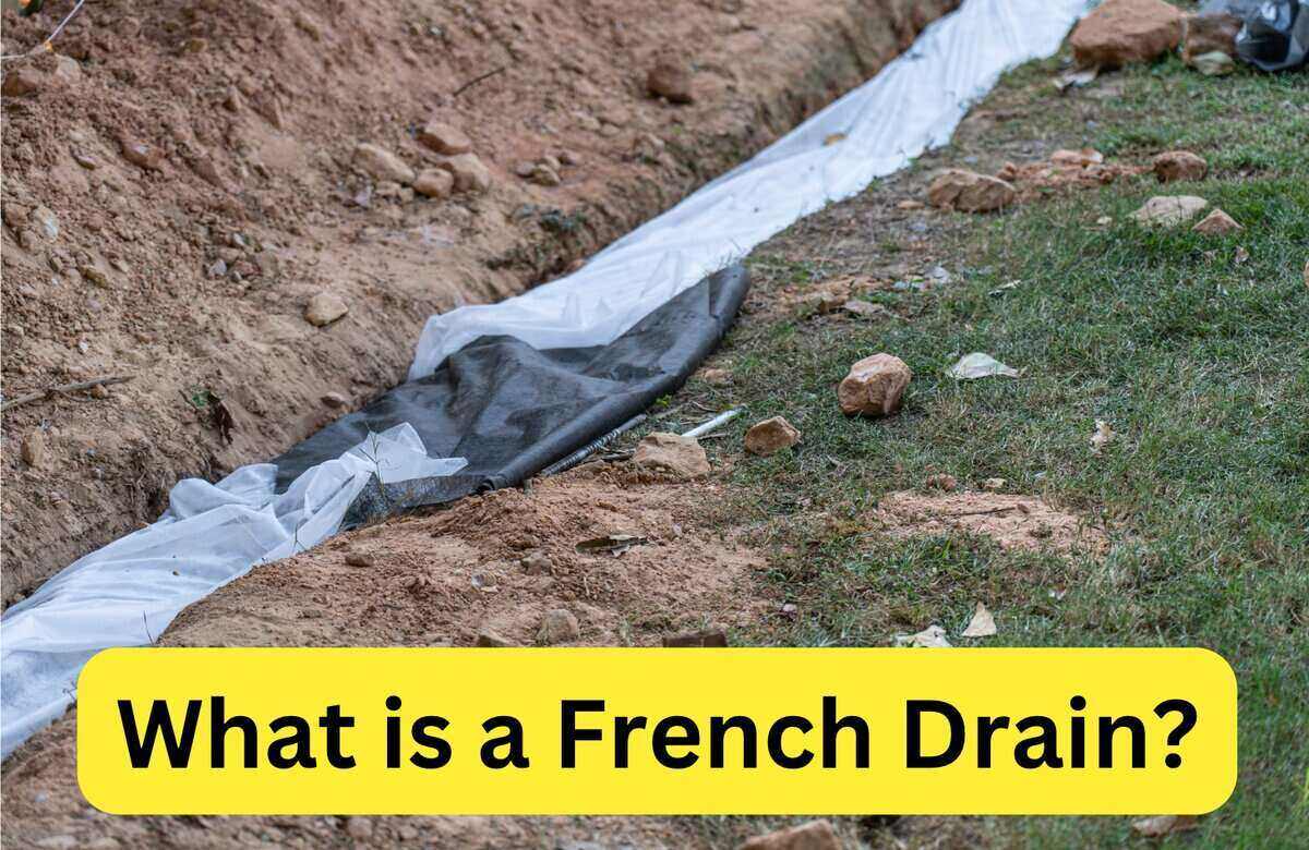 Landscape fabric lines a french drain in a yard