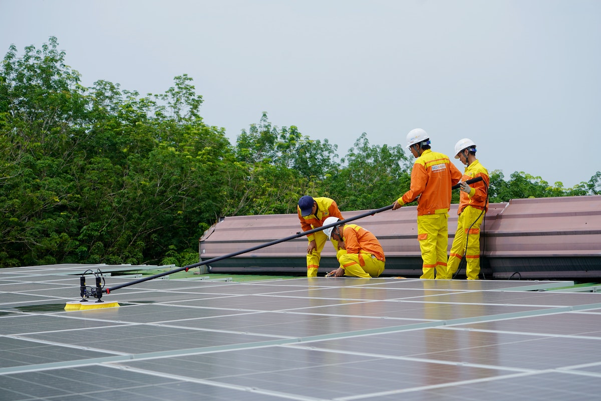Men Cleaning Solar Panels