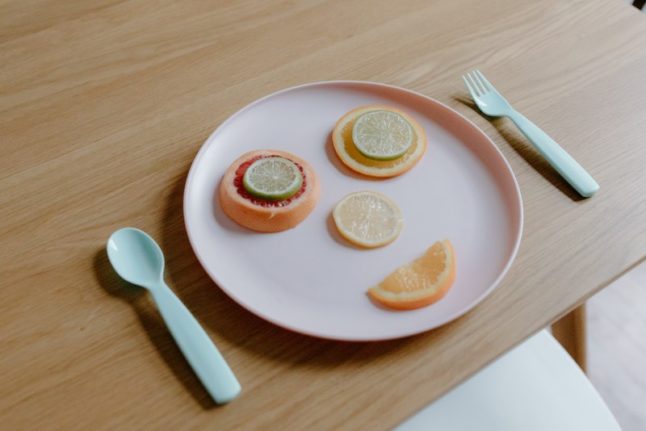 Plate with fruits in shape of face