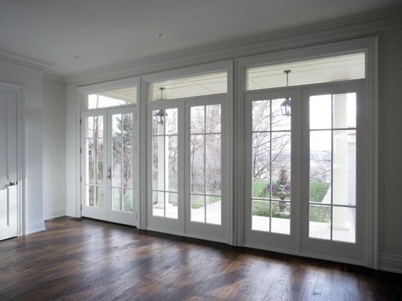 An inside view of white colored exterior french door