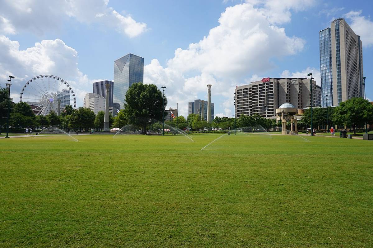Atlanta Centennial Olympic Park with the SkyView wheel and buildings in the rear