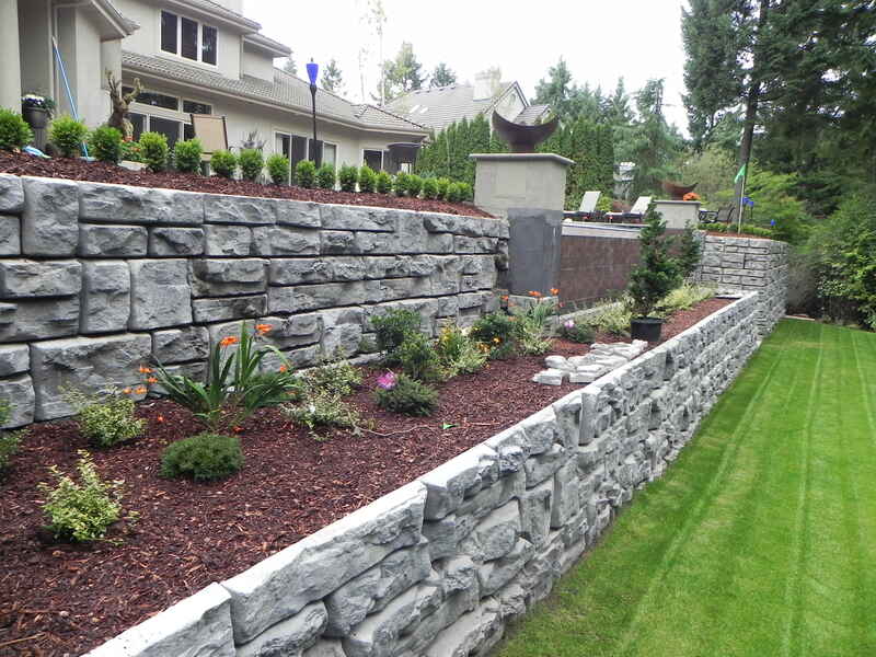 A raised flower bed of a yard