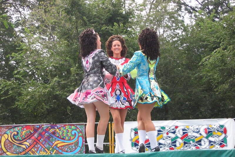 A female Irish dance trio performs at Celtic Fest in Chicago.