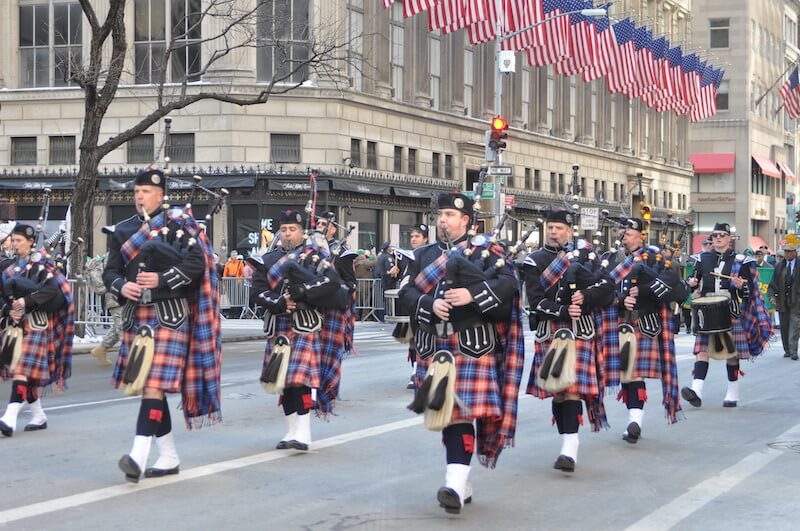 A large group of bagpipers formed by U.S. Army soldiers leads the New York City St. Patrick's Day Parade up 5th Avenue.