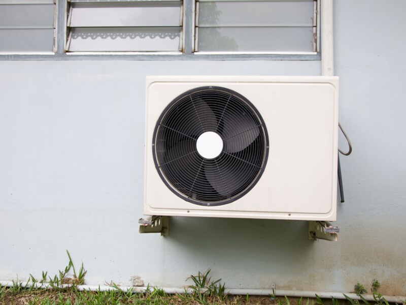 A heat pump installed outside a house