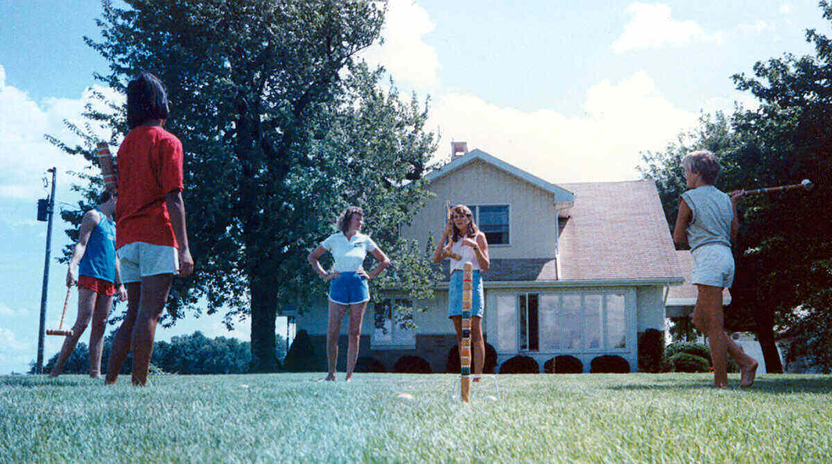 A family plays croquet in the front lawn of a Fort Wayne, Indiana, home