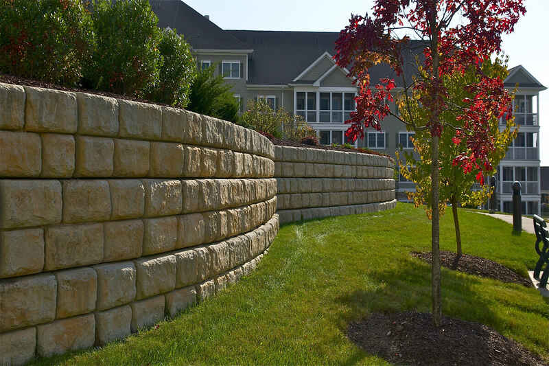 a retaining wall in front of a house