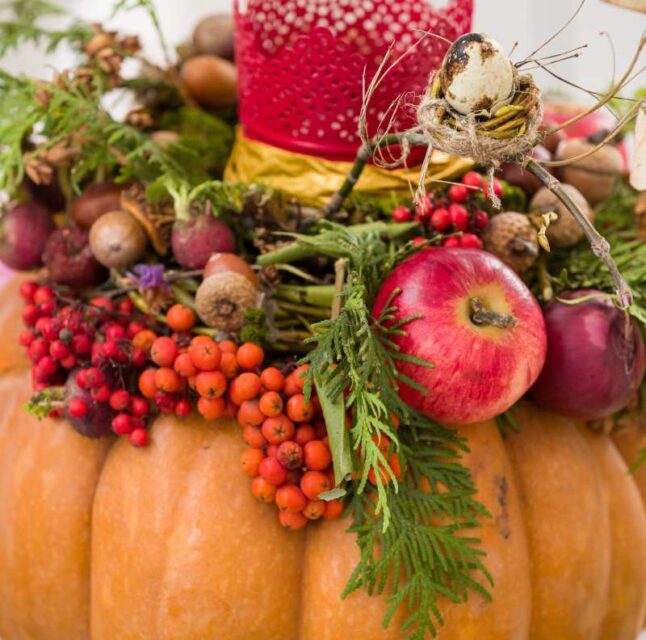 Beautiful thanksgiving centerpiece. Autumn pumpkin flower arrangement centerpiece.
