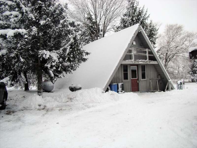 A-frame house surrounded with snow in Elizabeth, Illinois