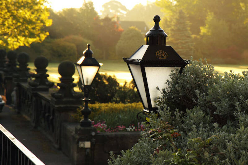 Decorative black lamps with a landscape background