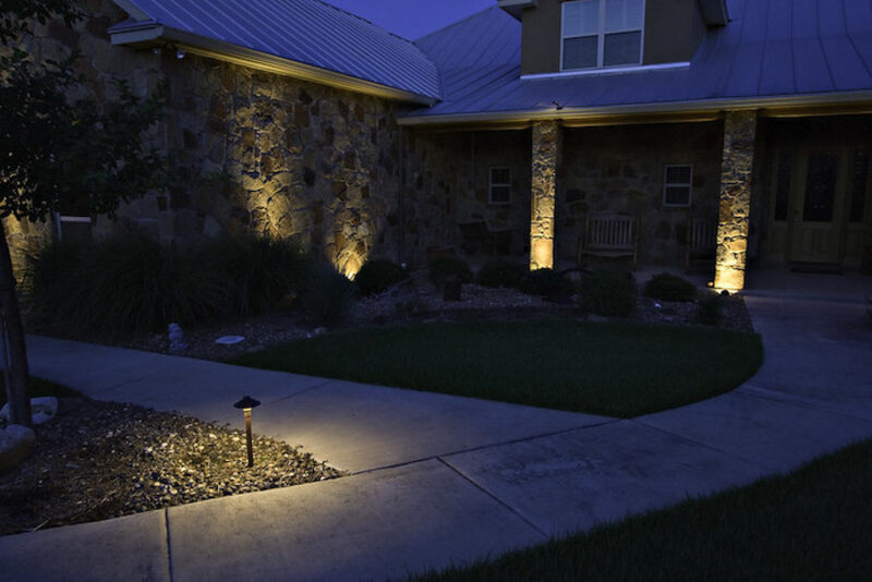 Uplighting effect on the side of a house at night