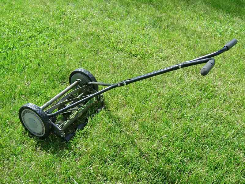 Reel Lawn mower on grass