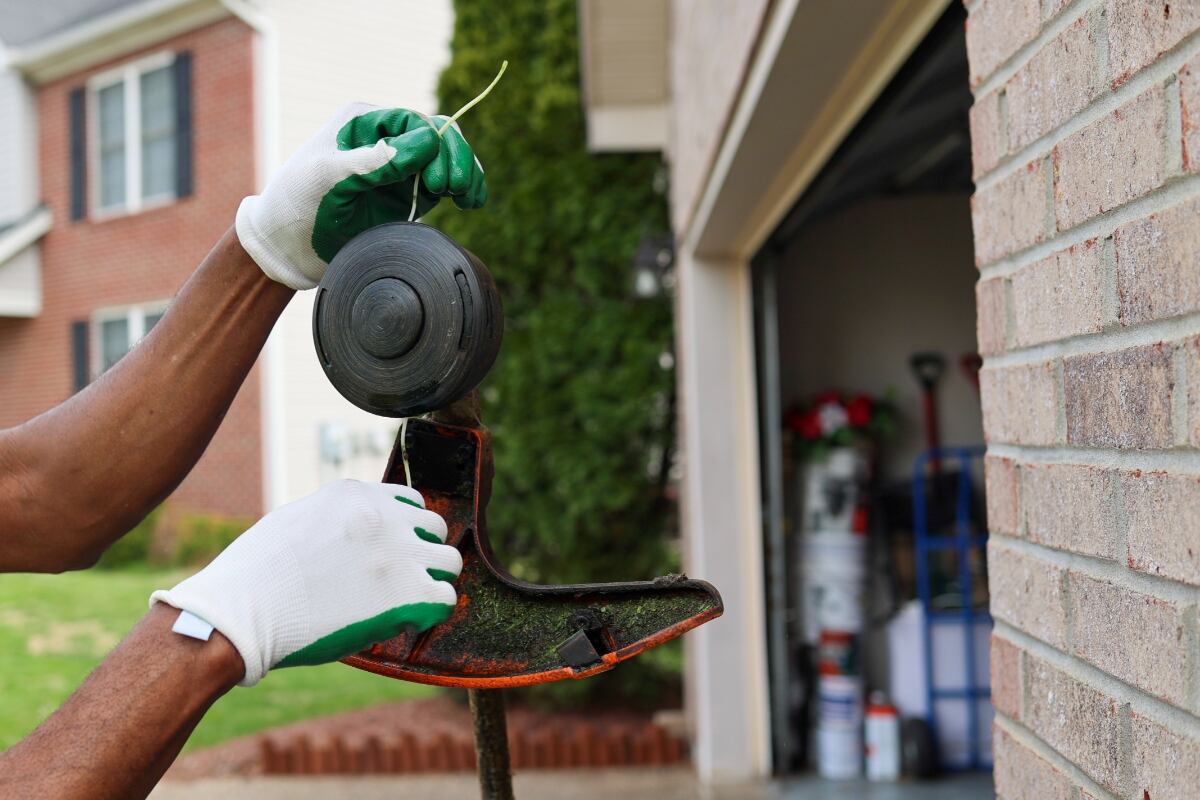 close up of a weed eater with two strings