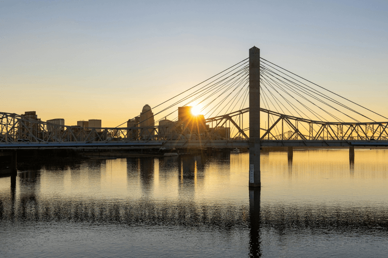 A view of the Louisville, Kentucky, skyline from the Ohio River at sunset
