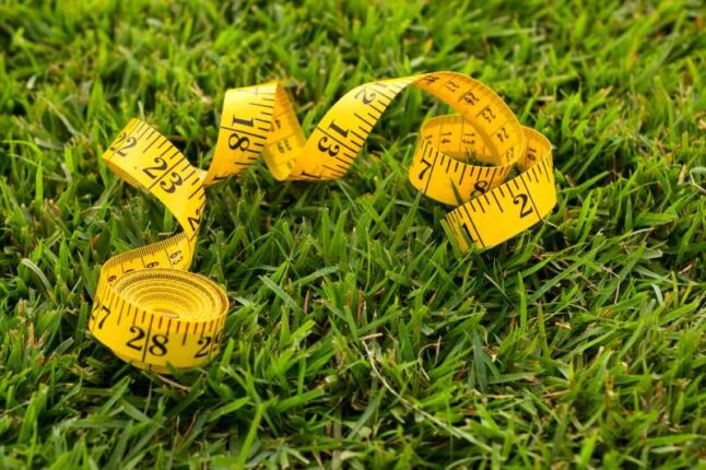 Tape measure on the grass