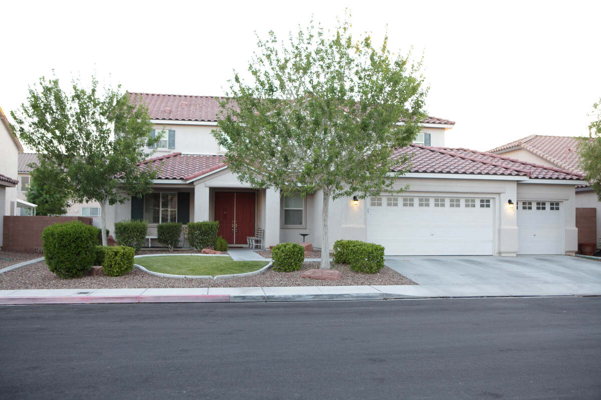 road in front of a house in las vegas