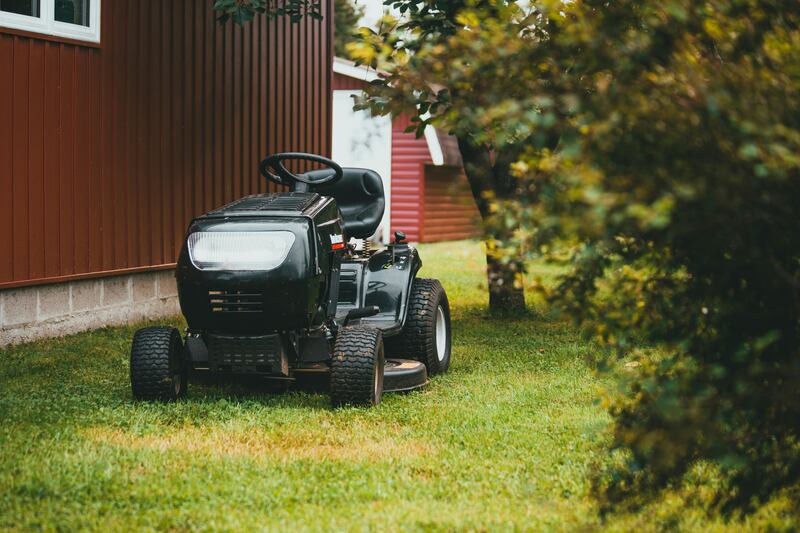 riding lawn mower in a lawn