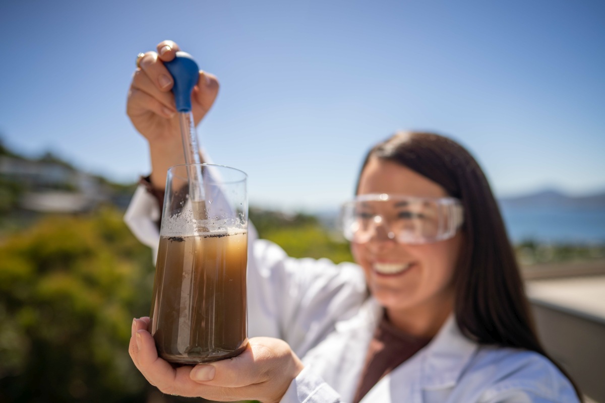 Woman performing soil testing