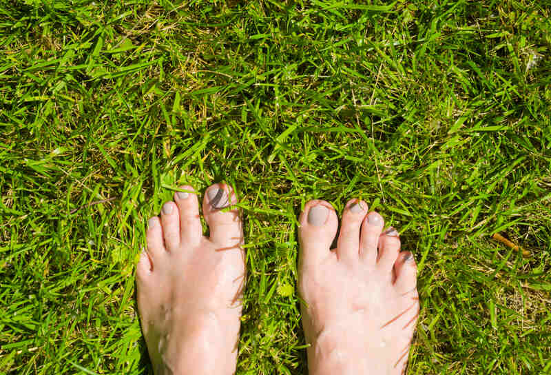 Woman standing in grass