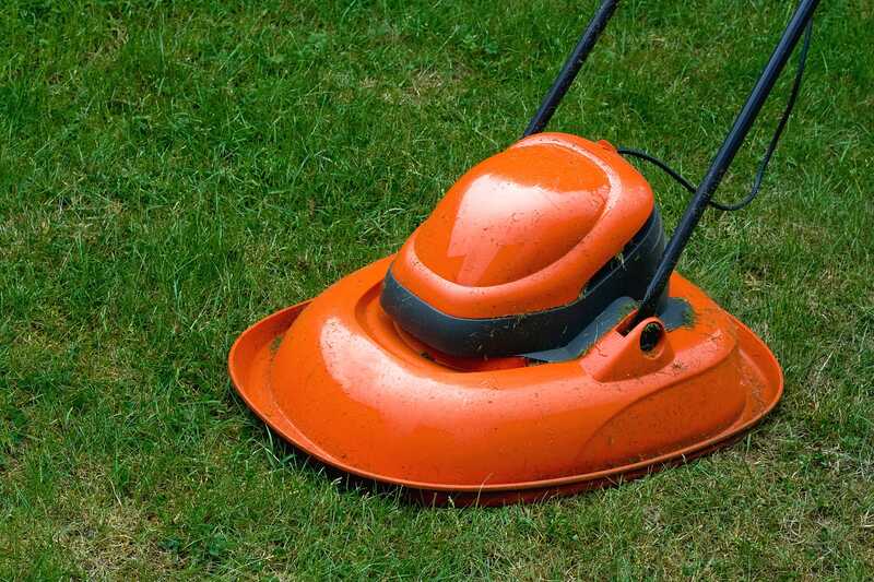 Garden hover lawn mower on grass 